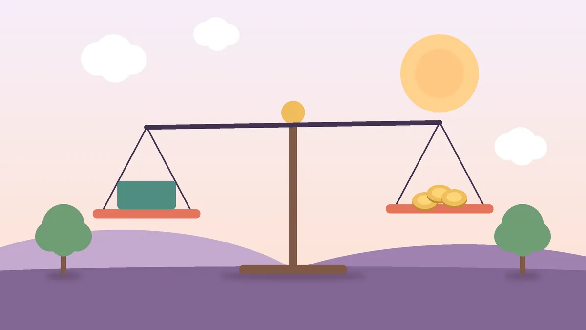 Balança com cartão e moedas, comparando as condições de isenção de anuidade