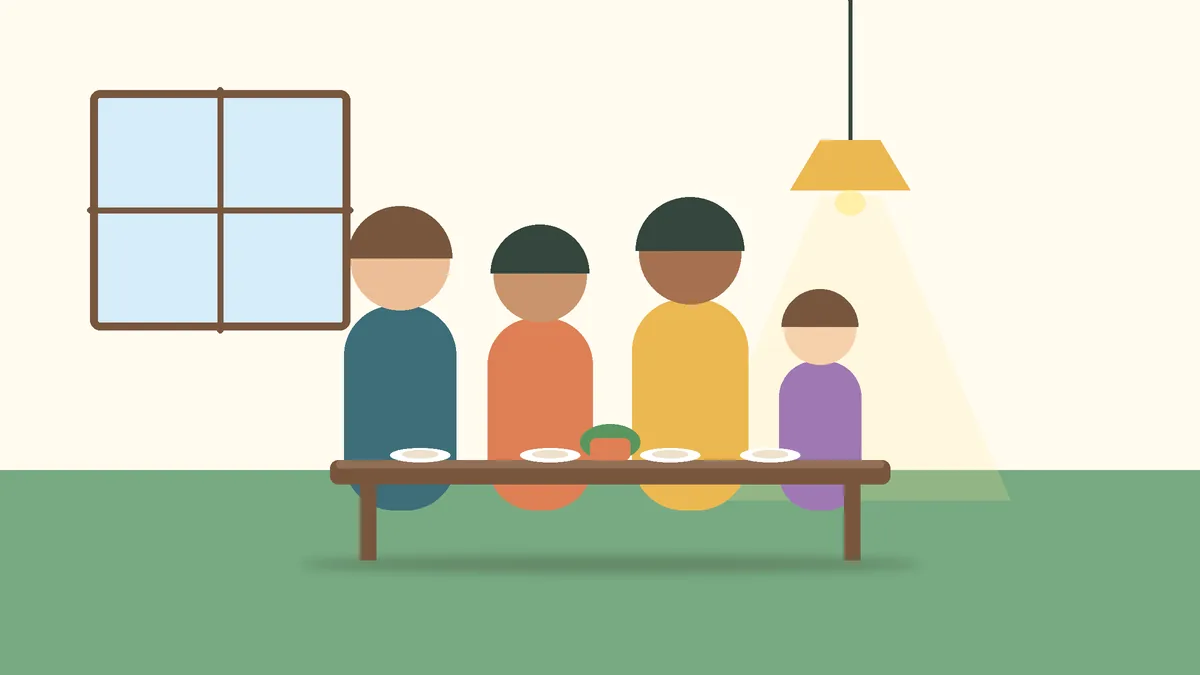 Família reunida à mesa, conversando sobre o orçamento da casa